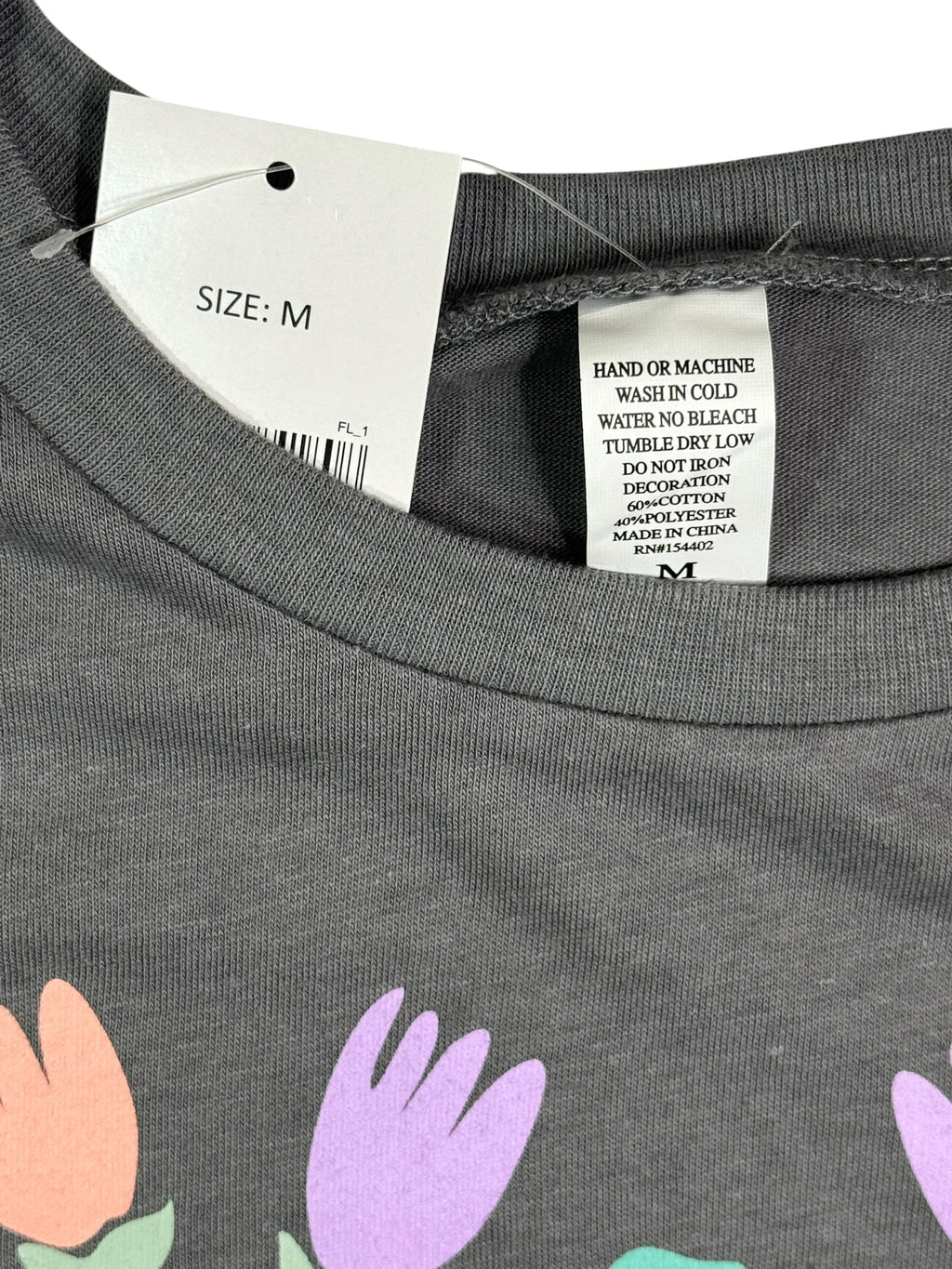 Camiseta gráfica floral "Day Dreamer"