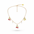 Cherry charm, pearl accents, and gold-tone necklace